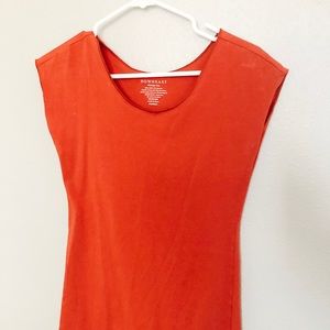 Wonder tee its a orange, brown, maroon color